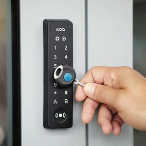 iLOQ NFC key and door reader